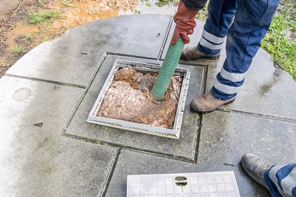 cesspool pumping is typically performed using a vacuum truck equipped with a powerful pump